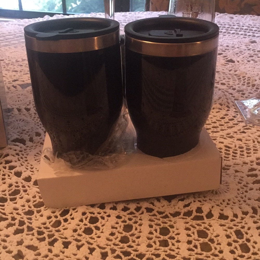Heated travel mugs